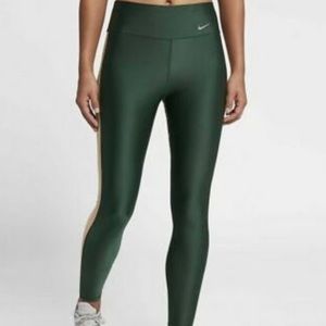Nike Dri Fit leggings in green and camo.